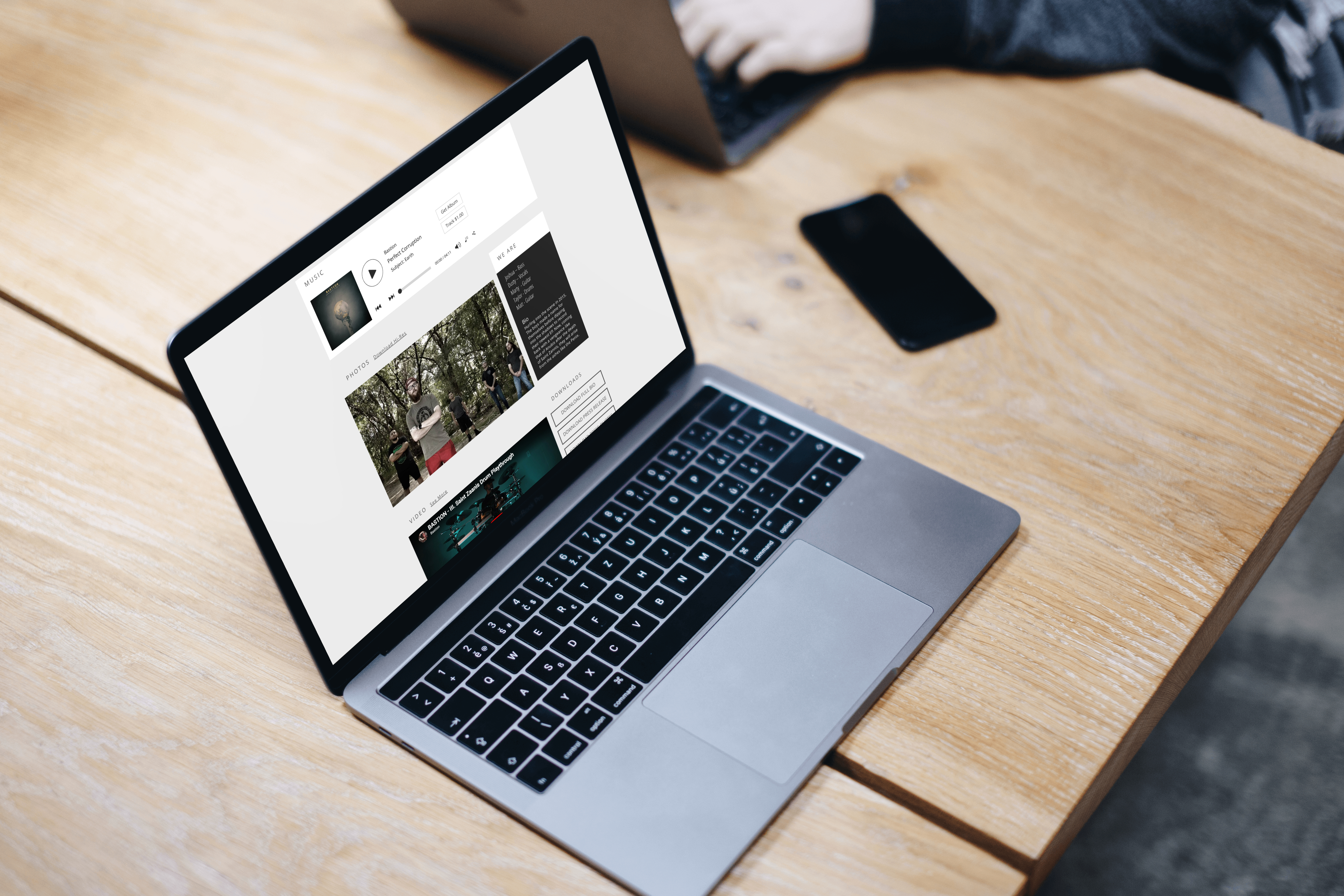 Bastion band website shown on a laptop