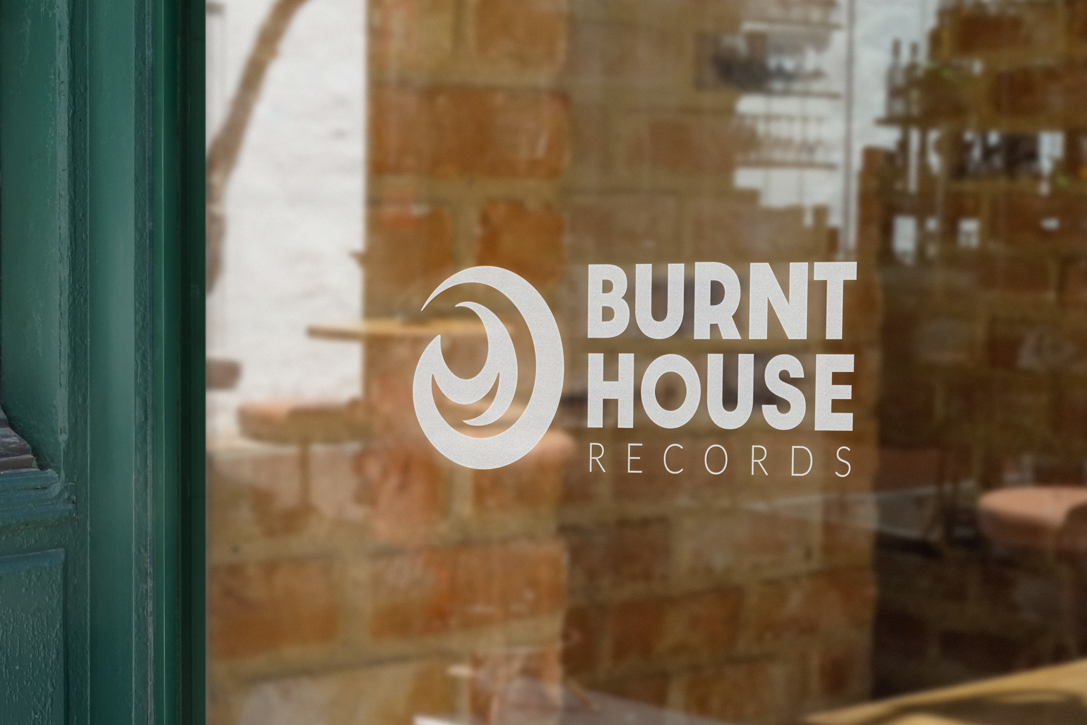 Burnt House Records logo etched on the studio storefront window